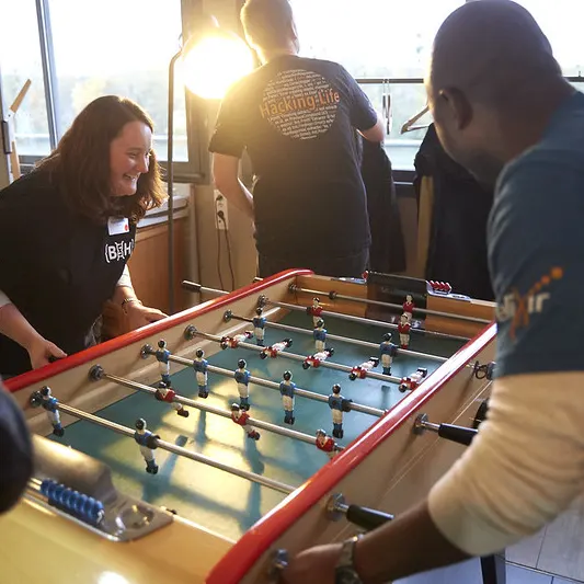 A group playing table football